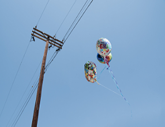 Mylar balloons near power lines.