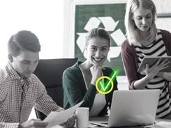 3 people at a desk