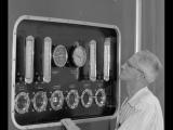 Man looking at power monitors