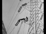 Upward view of power transmission tower