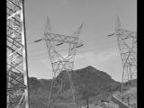 Power transmission lines framed by scaffolding