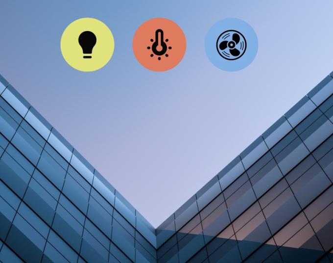 Photo of an office building with icons for lighting, heating, and cooling overlaid.