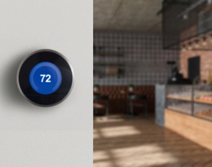 smart thermostat hanging on wall