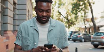 Man looking at cell phone 