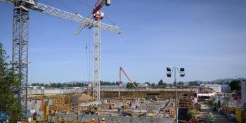 construction activities surrounding a construction crane
